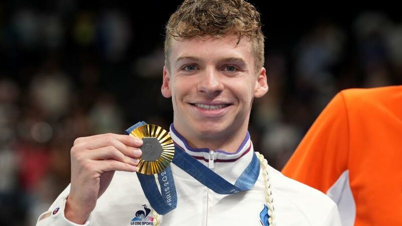 Leon Marcand becomes the first swimmer to win two individual gold medals in a single day since 1976